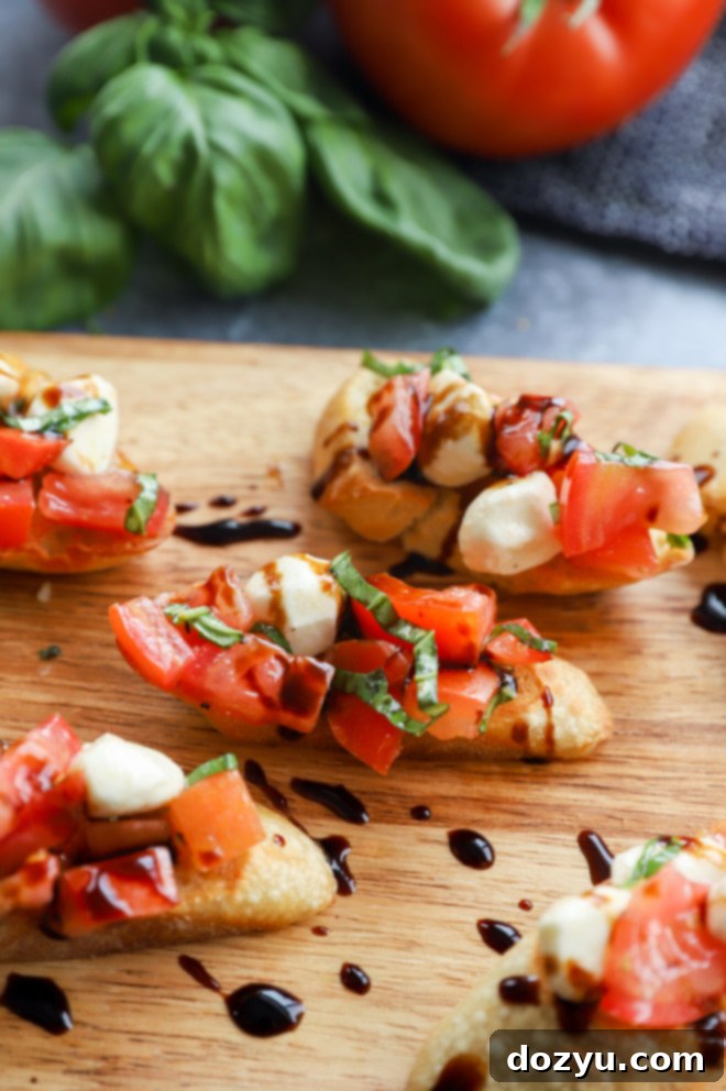 Caprese Bruschetta 10 Image of Italian appetizer on platter