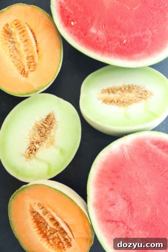 Sweet and Salty Melon Prosciutto Salad 3 Watermelon cantaloupe and honeydew cut in half picture