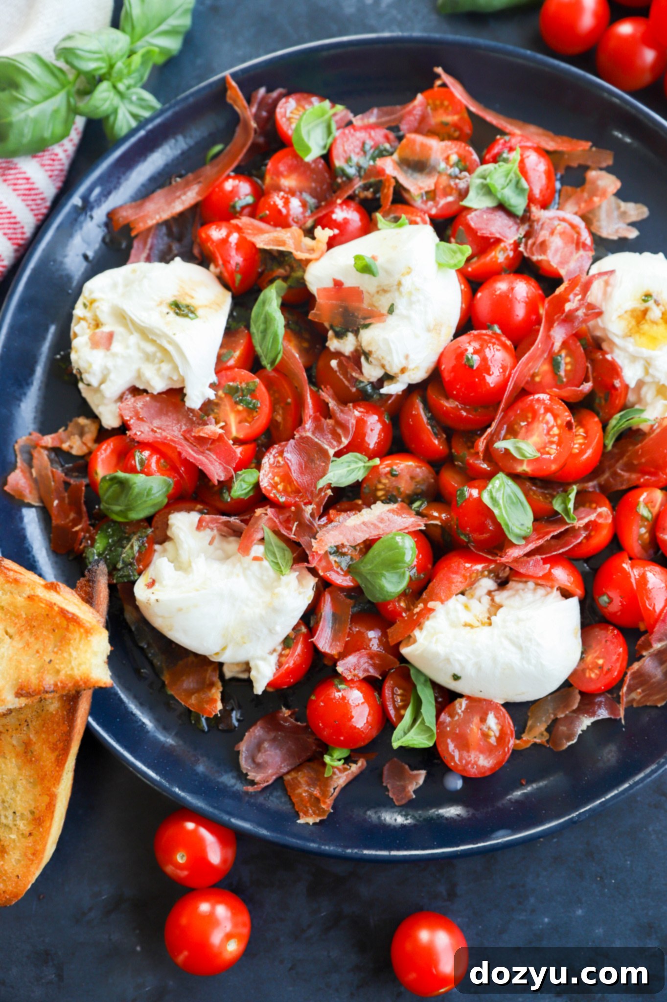 Creamy Burrata Caprese Salad 2 picture of summer salad recipe on platter