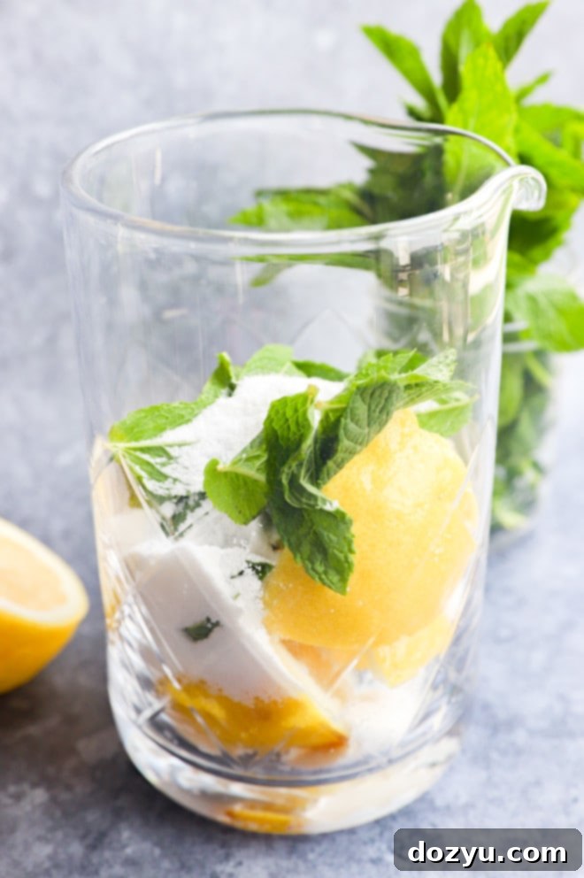 Zesty Lemon Mojito 4 Preparing lemon mojitos in a jar