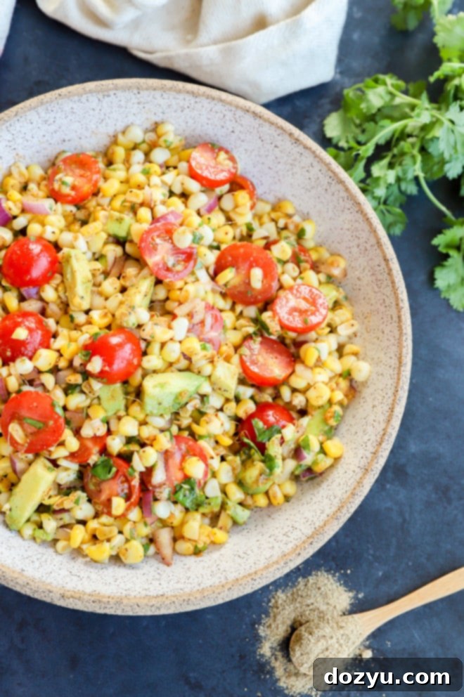 Vibrant Masala Corn Salad 2 Bowl of a vibrant Masala Corn Salad with chaat masala and fresh vegetables