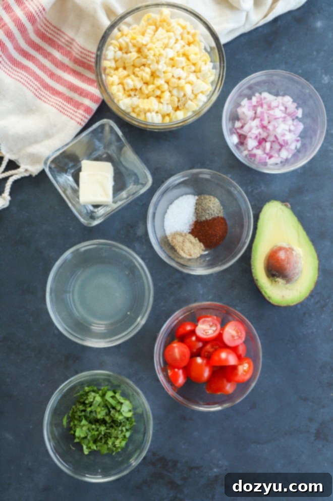 Vibrant Masala Corn Salad 3 Fresh ingredients laid out for making Masala Corn Salad, including corn, tomatoes, onions, cilantro, and spices.