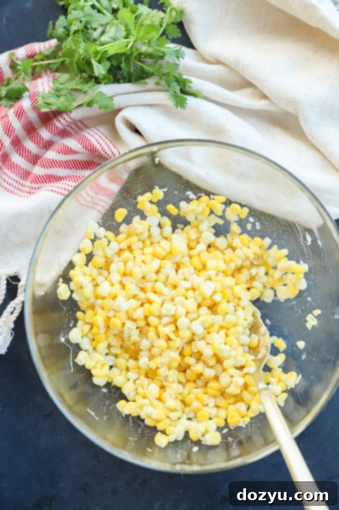 Vibrant Masala Corn Salad 4 Close-up of boiled corn kernels in a bowl, ready for the next step of the Masala Corn Salad recipe.