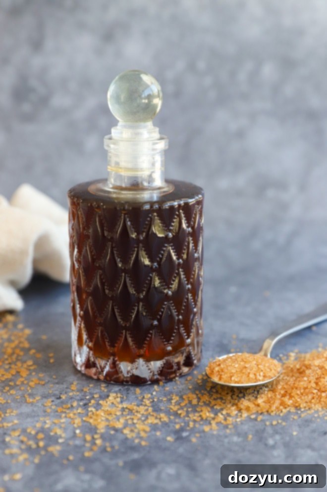 Golden Cane Syrup 9 Demerara simple syrup in a bottle, showcasing its rich golden color