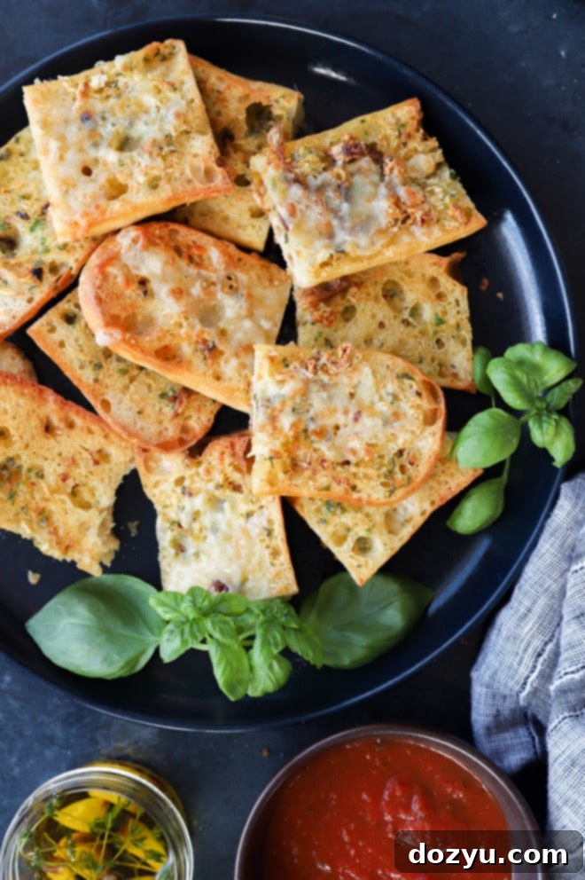 Crispy Air Fryer Roasted Garlic Bread 2 Image of a plate of air fryer roasted garlic bread