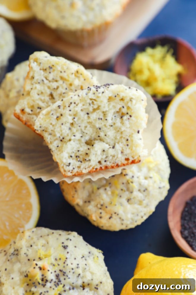 Sunshine Lemon Poppy Seed Muffins 8 Pile of fluffy, moist lemon poppy seed muffins, perfect for breakfast