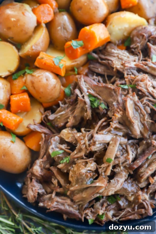 Fork-Tender Instant Pot Pot Roast 10 Instant Pot Roast Beef on a plate with vegetables