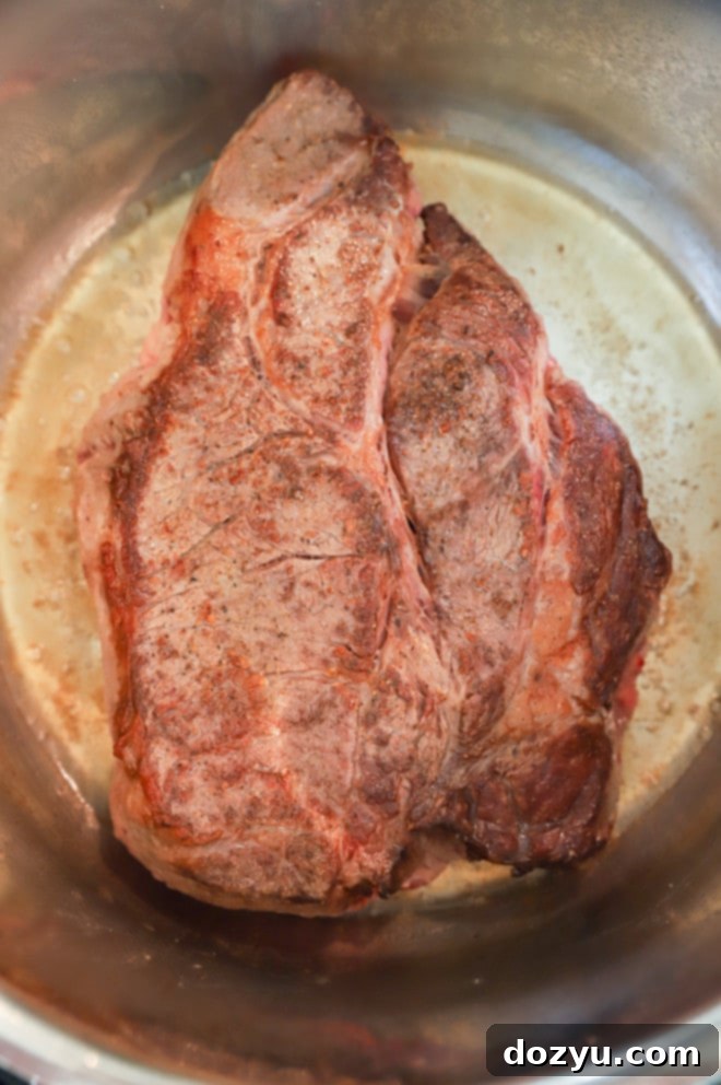 Fork-Tender Instant Pot Pot Roast 6 seared chuck roast in instant pot