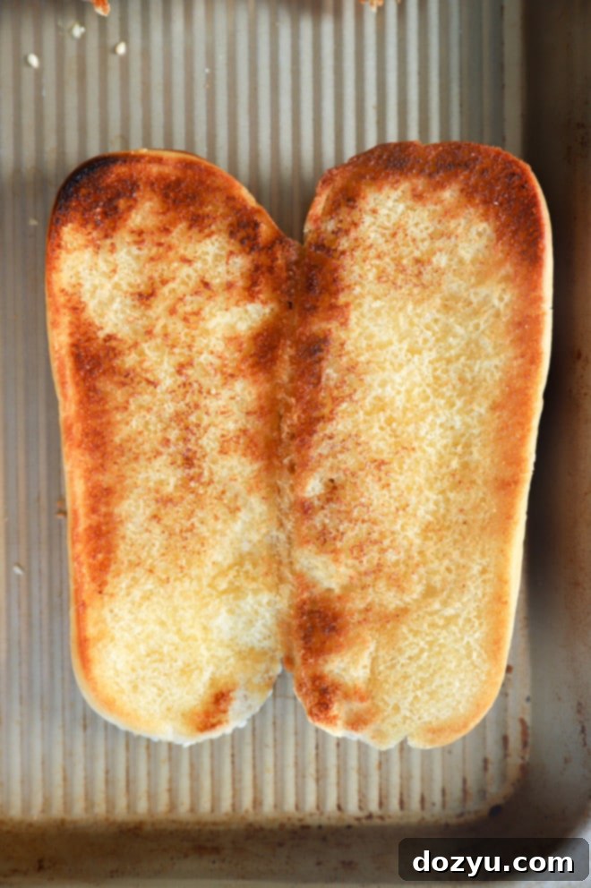Ultimate French Dip 5 Hoagie bun toasted with garlic butter on a sheet pan