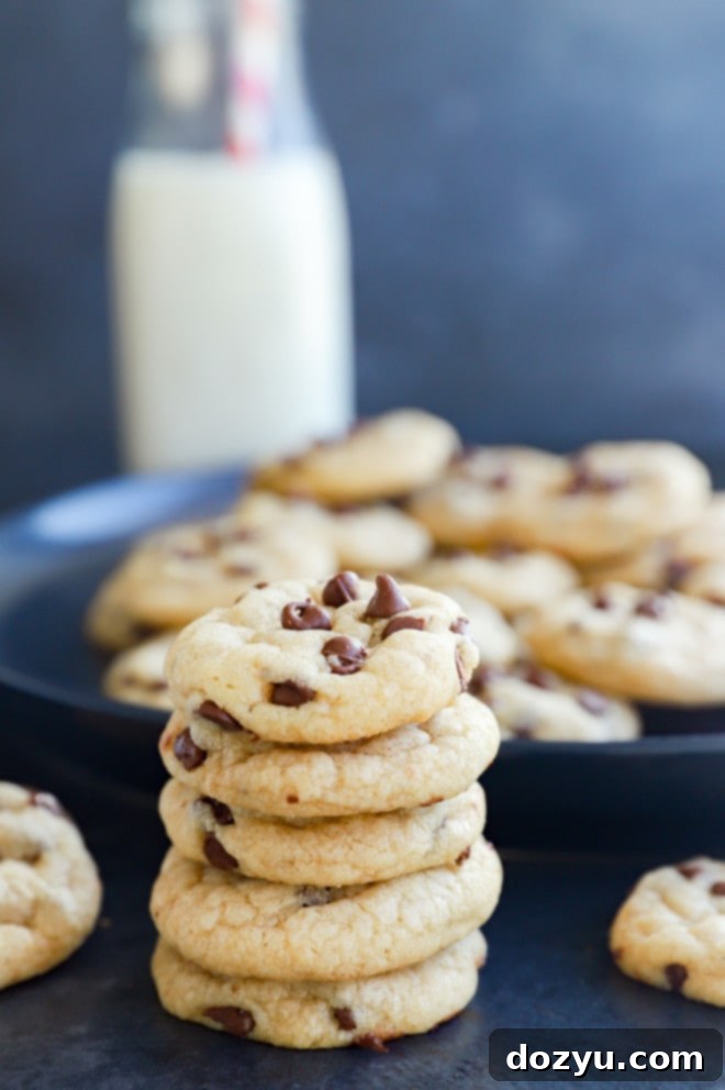 Bite-Sized Chocolate Chip Delights 8 Stack of cookies with milk in the background
