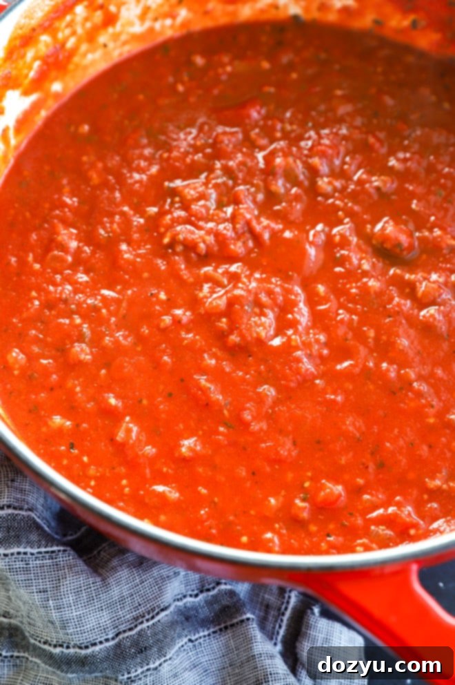 Classic Baked Rigatoni 5 Homemade marinara sauce in a large pot