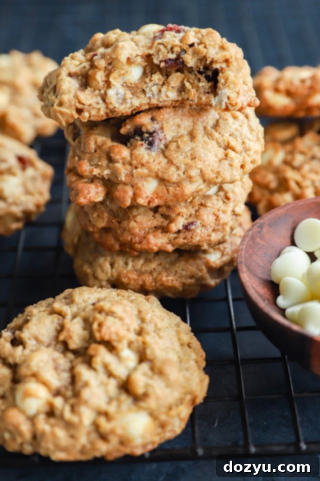 Cranberry White Chocolate Oatmeal Delights 3 Pile of holiday treats with a bit taken out of one