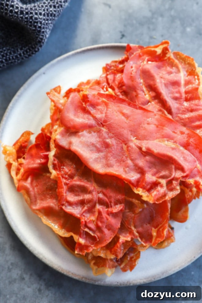 Prosciutto Crisps 2 pile of crispy prosciutto di parma on a plate