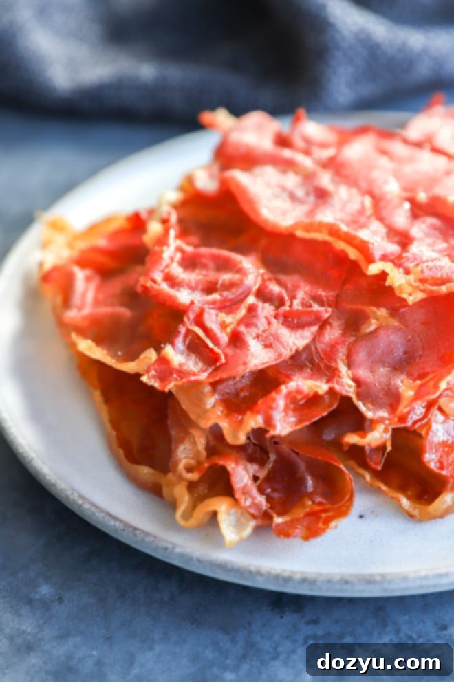 Prosciutto Crisps 5 Crispy prosciutto on a plate with napkin