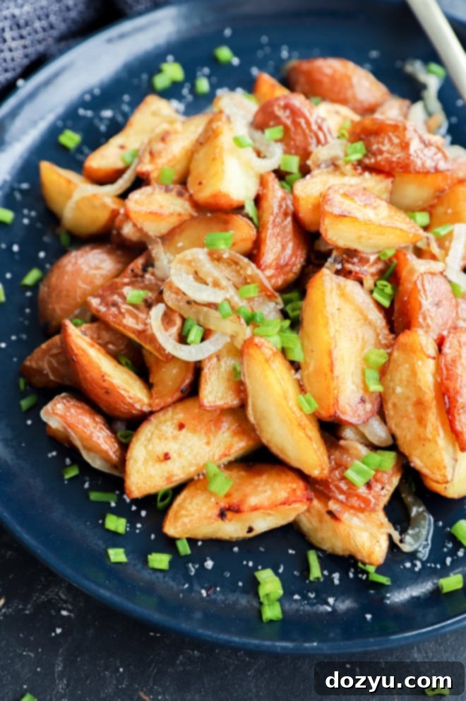 Crispy Oven Roasted Potatoes and Onions 2 classic side dish recipe made with vegetables on a plate