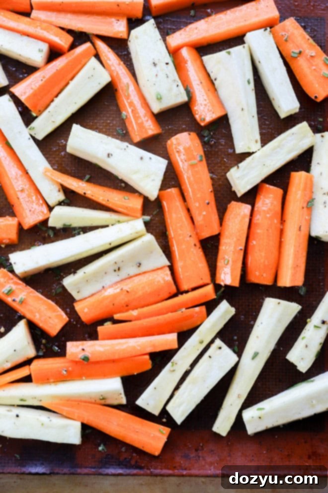 Golden Honey-Kissed Root Vegetables 5 before baking vegetables on a sheet pan with fresh herbs