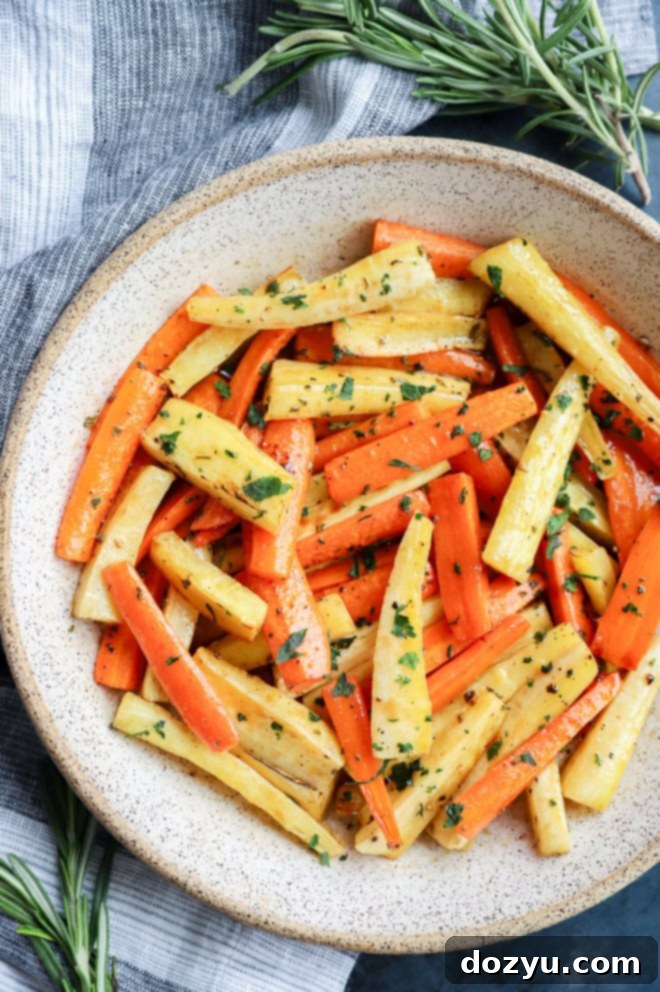 Golden Honey-Kissed Root Vegetables 6 fresh parsley on top of honey glazed carrots and parsnips