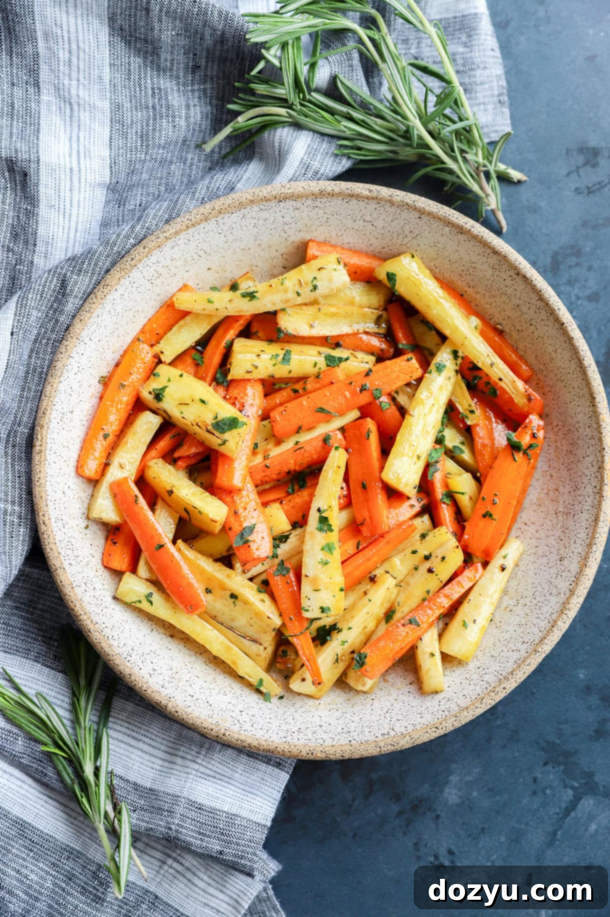 Golden Honey-Kissed Root Vegetables 10 easy root vegetable side dish in bowl with fresh rosemary