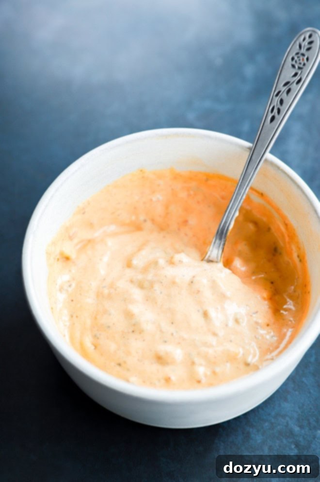 Bold Chipotle Aioli 7 chipotle aioli in a bowl with a spoon