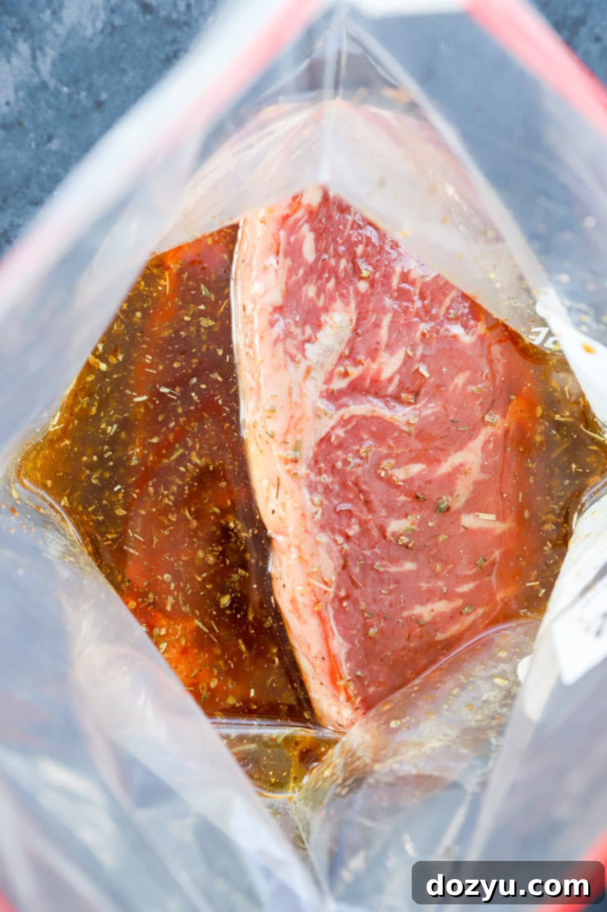 Effortless 3-Ingredient Steak Marinade 11 steaks in 3-ingredient steak marinade in a resealable bag