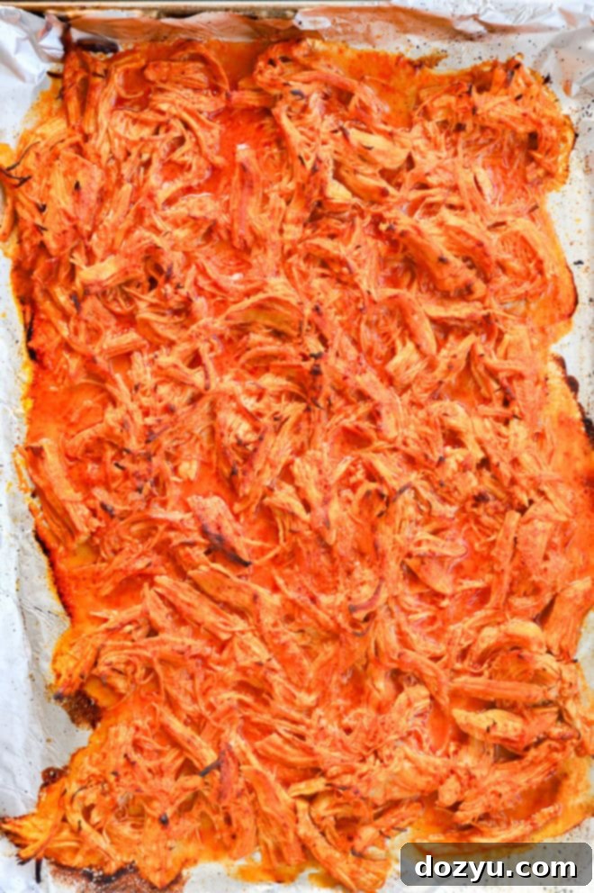 Zesty Cilantro Ranch Buffalo Chicken Tacos 5 baked buffalo chicken on sheet pan