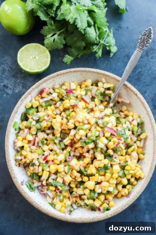 Smoky Roasted Corn Salsa 6 fresh vegetable appetizer in a bowl with cilantro and lime