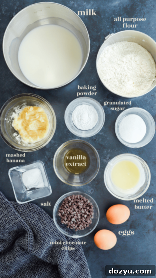 Ultimate Banana Chocolate Chip Waffles 3 All the fresh and dry ingredients for banana chocolate chip waffles laid out on a table with text labels