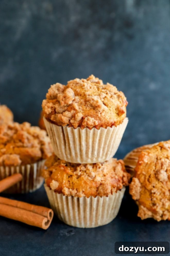 Spiced Pumpkin Banana Muffins 11 pumpkin banana muffins stacks with cinnamon sticks