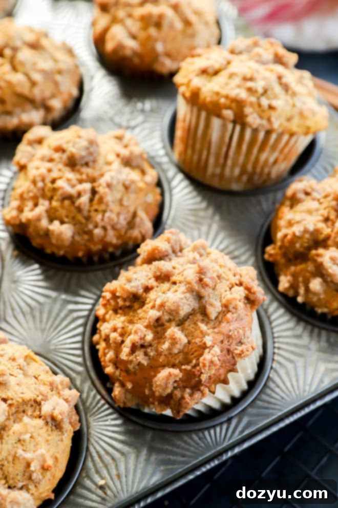 Spiced Pumpkin Banana Muffins 10 easy fall breakfast baked goodies in pan with red and white linen