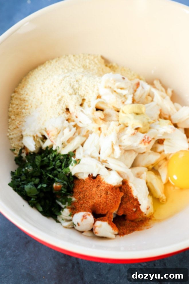 Golden Baked Crab Cakes 4 maryland crab cake mixture in bowl before stirring