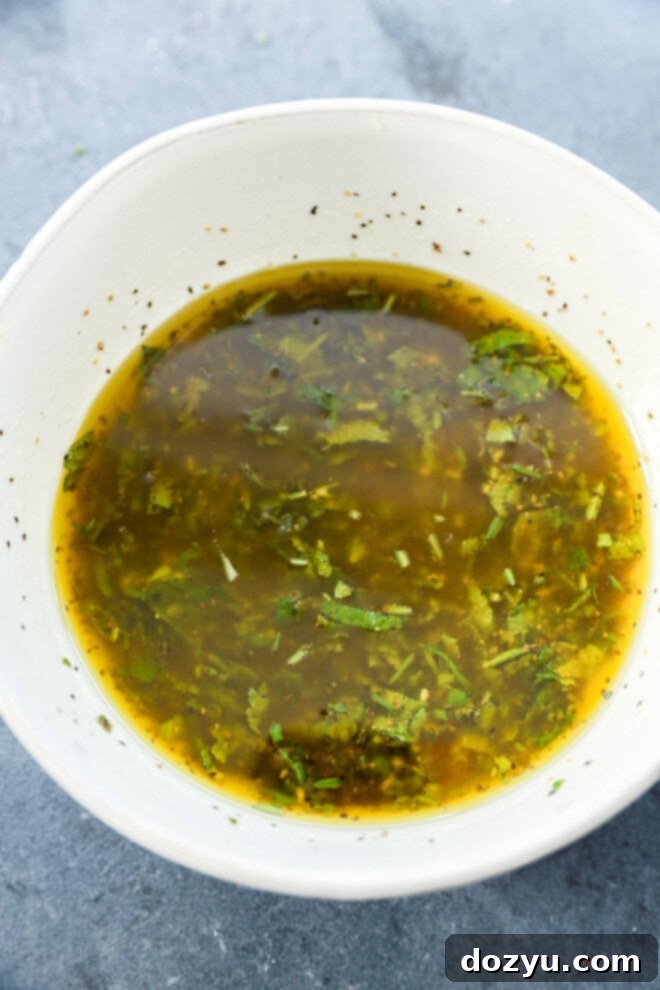 Succulent Lamb Marinade 4 Easy sauce being prepped in a bowl before marinating juicy meat for grilling