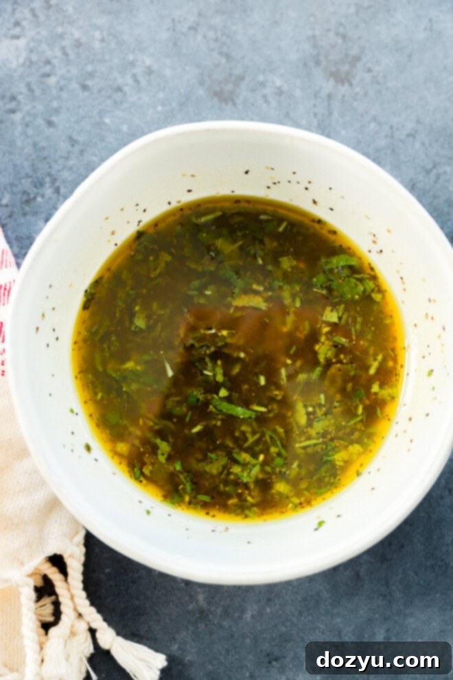 Succulent Lamb Marinade 6 Lamb marinade mixture in a bowl with a linen cloth