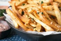 Signature Spicy Garlic Cilantro Fries with Curry Ketchup