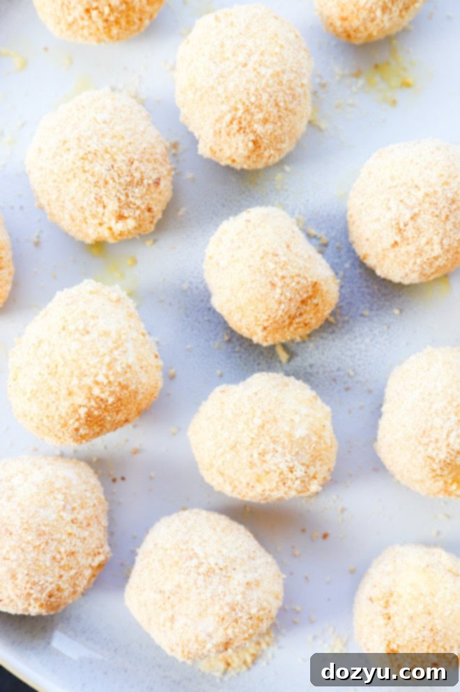 cheese balls dredged in flour, egg, and breadcrumbs before frying