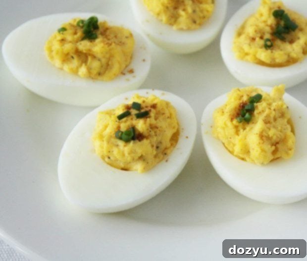 Close-up of Truffle Deviled Eggs garnished with chives