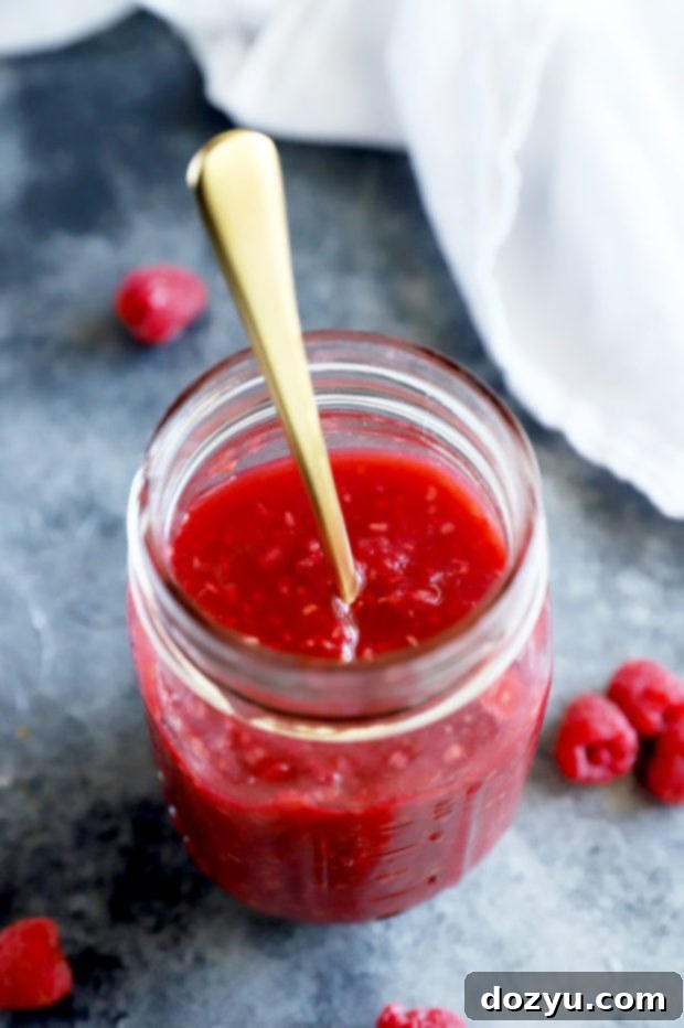 Raspberry sauce in jar image