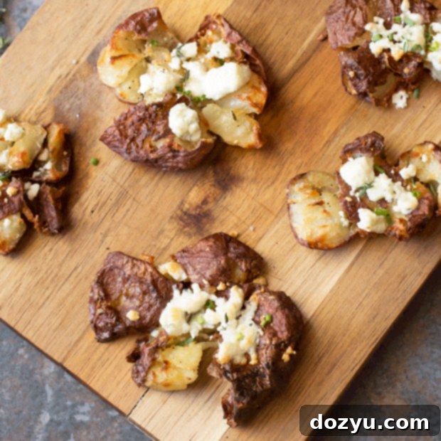 Smashed Potatoes with Fresh Herbs & Blue Cheese Recipe Card Image