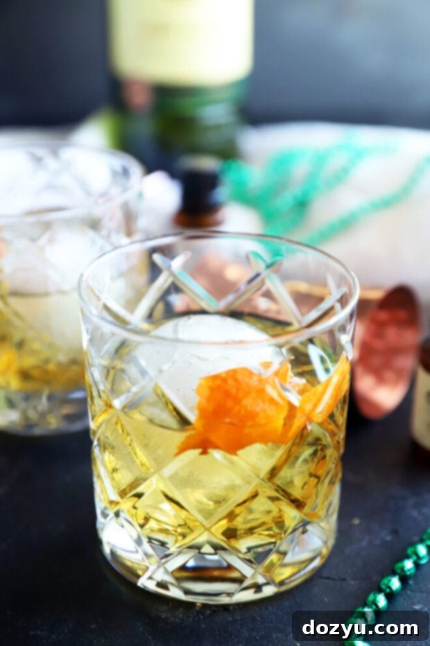 The Jameson Old Fashioned 8 Jameson cocktail in glasses picture, two glasses side by side on a light background, highlighting their clarity