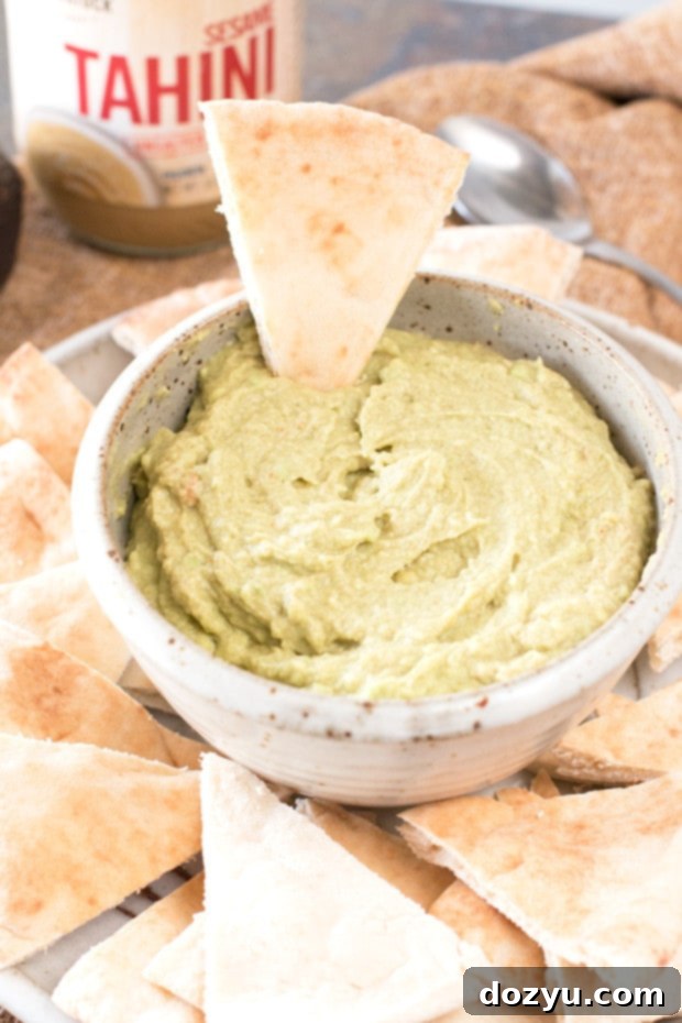 Close-up of Avocado Tahini Dip in a bowl, showing its creamy texture