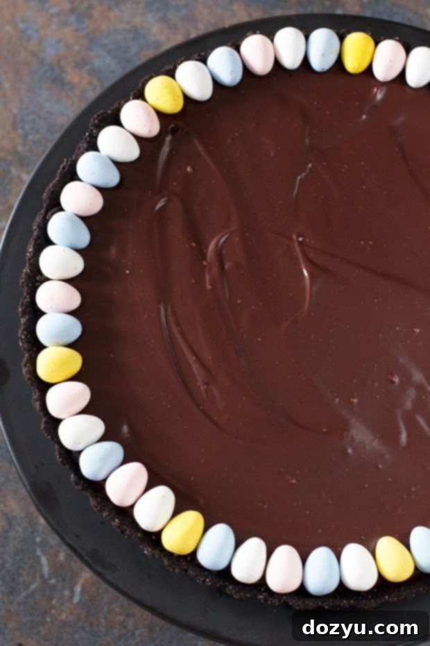 Rich Chocolate Bourbon Caramel Tart with a flaky crust