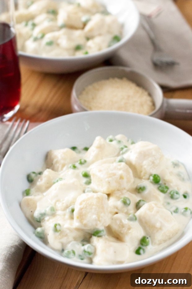 Ricotta Gnocchi with Lemon Cream Sauce & Peas | cakenknife.com