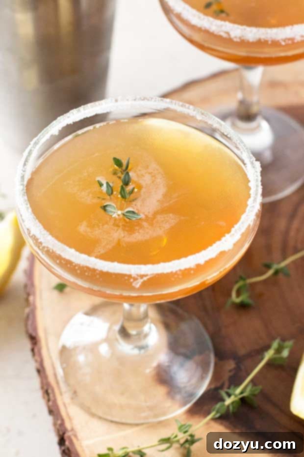Lemon Thyme Sidecar with fresh lemon and thyme garnish, perfect for spring