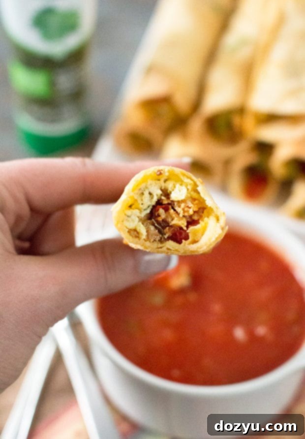 Sunrise Roll-ups 6 Close-up of prepared breakfast taquitos filled with eggs, chorizo, and vegetables