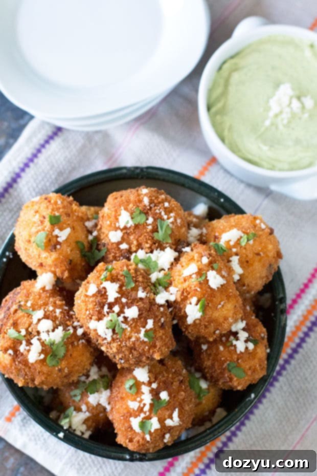 Close-up of Mexican Arancini, showing the crispy exterior and golden color