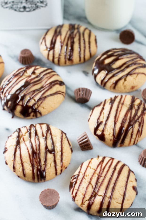 Gooey Caramel-Filled Peanut Butter Cookies 2 Caramel Stuffed Peanut Butter Cookies | cakenknife.com