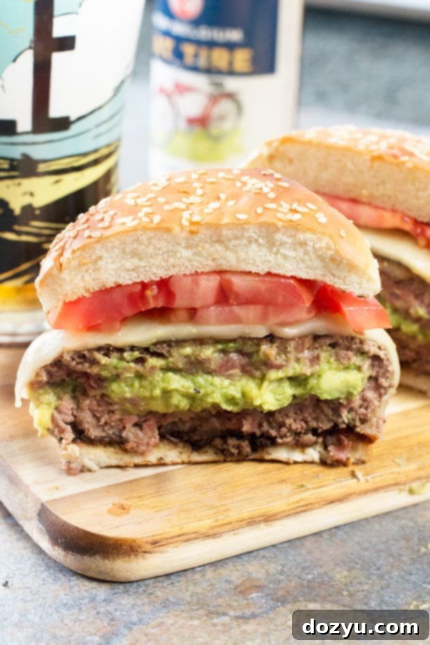 A perfectly grilled Bacon-Wrapped Guacamole Burger Bomb ready to be served
