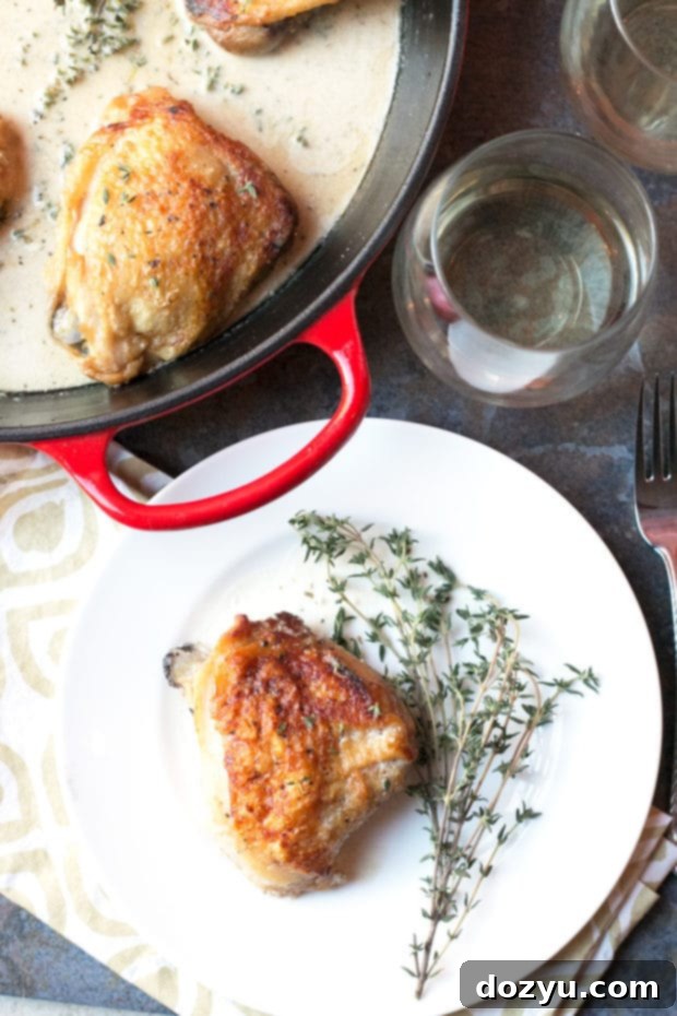 Hearty Creamy Roasted Chicken Thighs Skillet with Garlic and White Wine Sauce