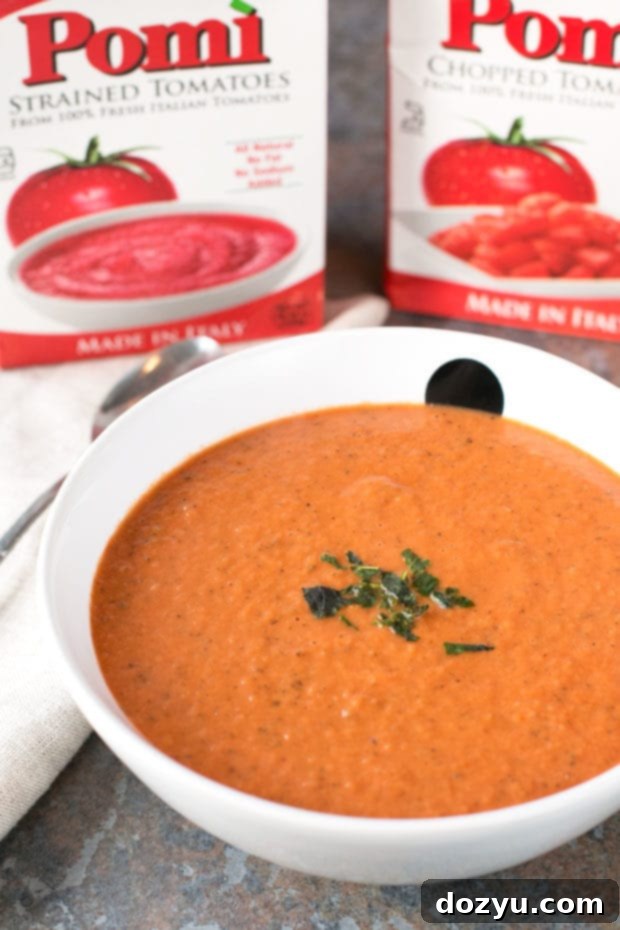 Close-up of fresh, high-quality tomatoes, ideal for making flavorful tomato basil soup.