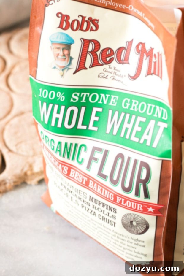 Stack of savory whole wheat biscuits with green chiles and cheddar cheese.