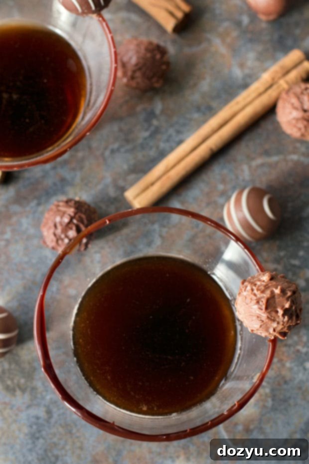 Spiced Truffle Martini ingredients, showing dark chocolate liqueur, vodka, and spices